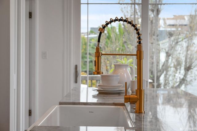 a view of a kitchen with washer and dryer