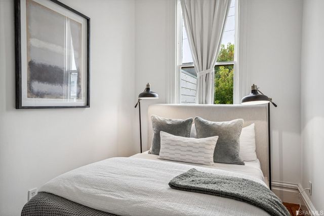 a view of parking garage with cars