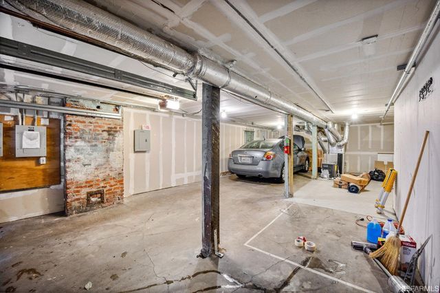 a kitchen with stainless steel appliances granite countertop a stove and more cabinets