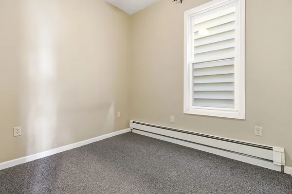 a view of a room with a window