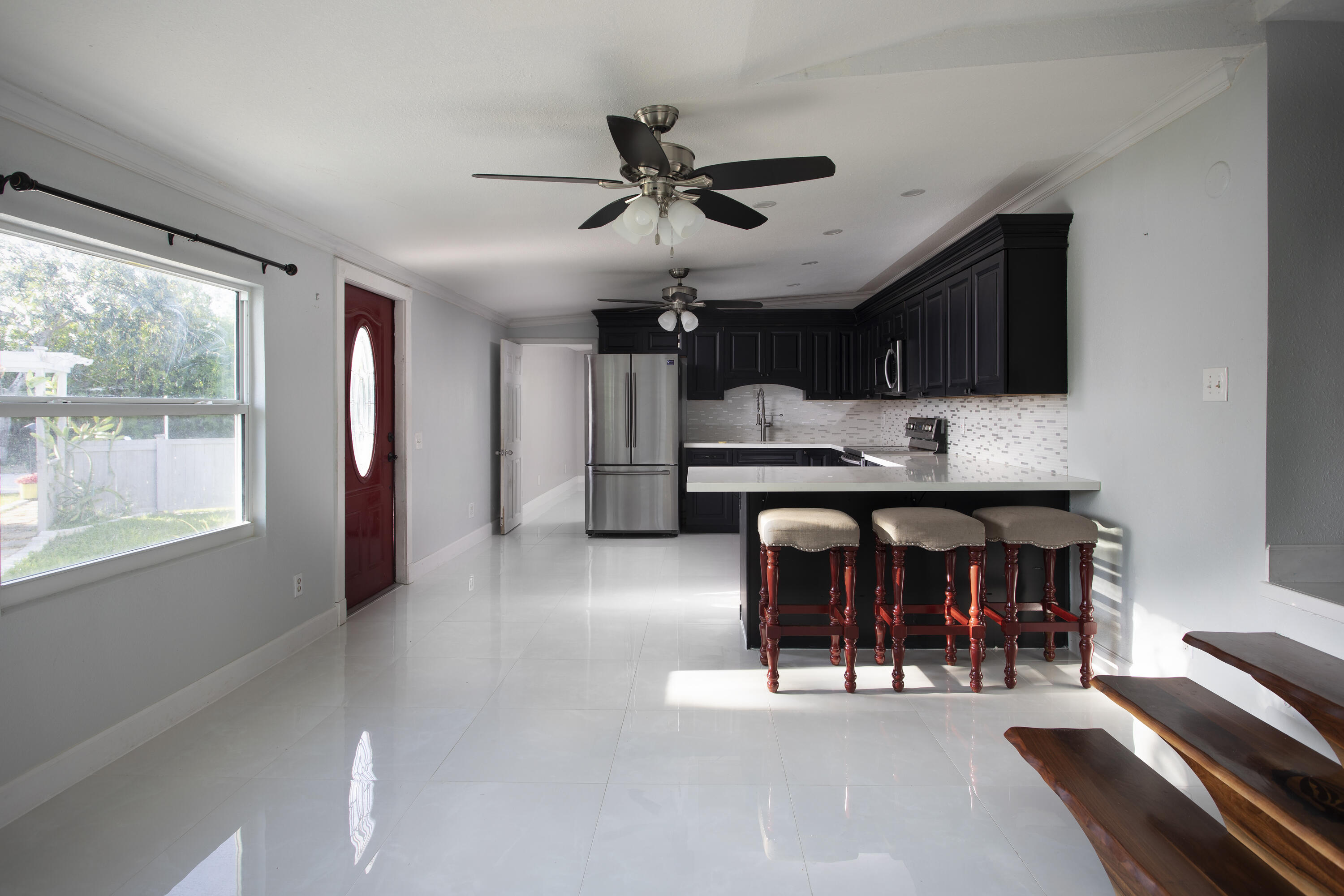 35 Dondi Road Key West, FL 33040 - Photo 5 of 15 a view of a livingroom with furniture window and a ceiling fan