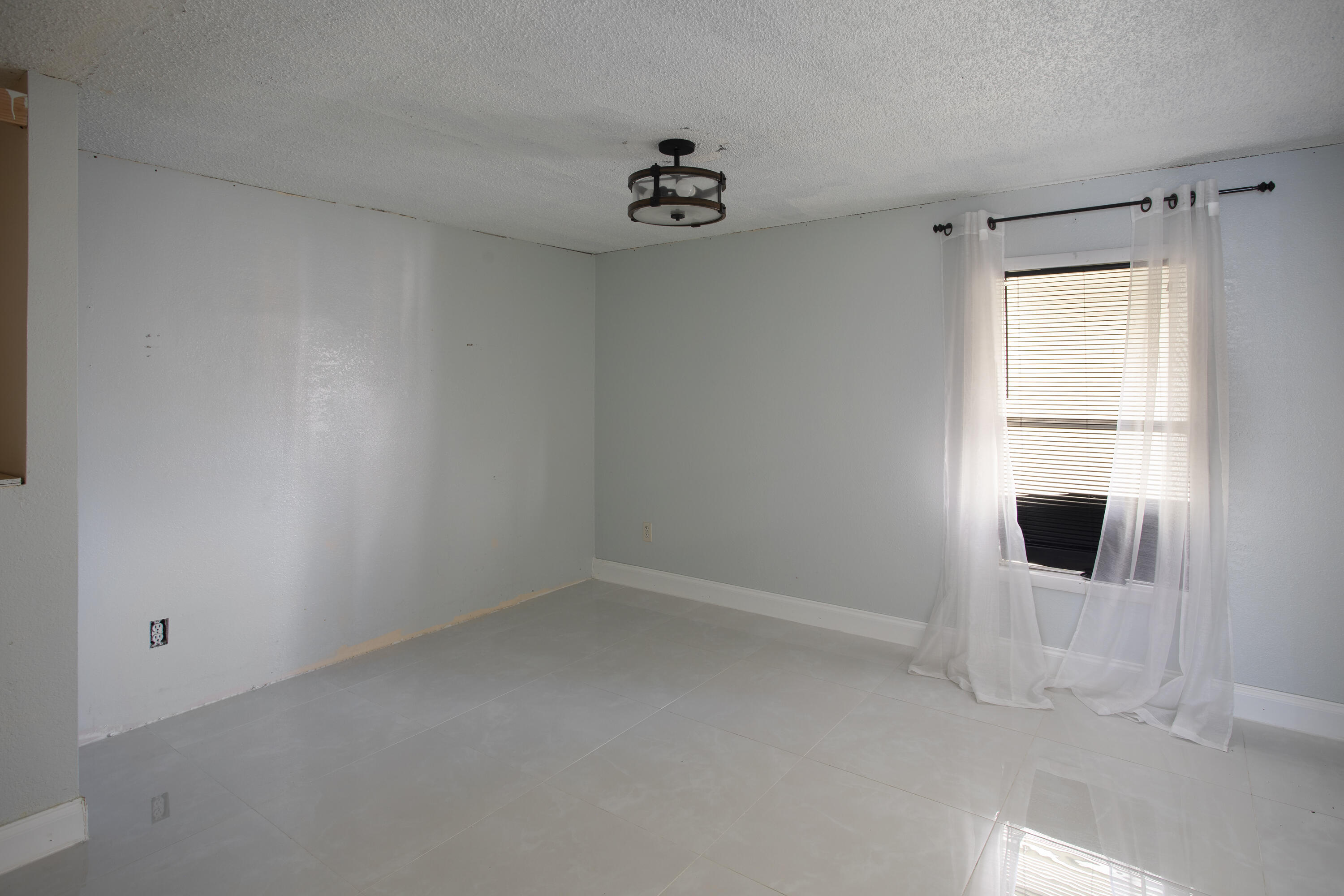 35 Dondi Road Key West, FL 33040 - Photo 7 of 15 a view of empty room with a window