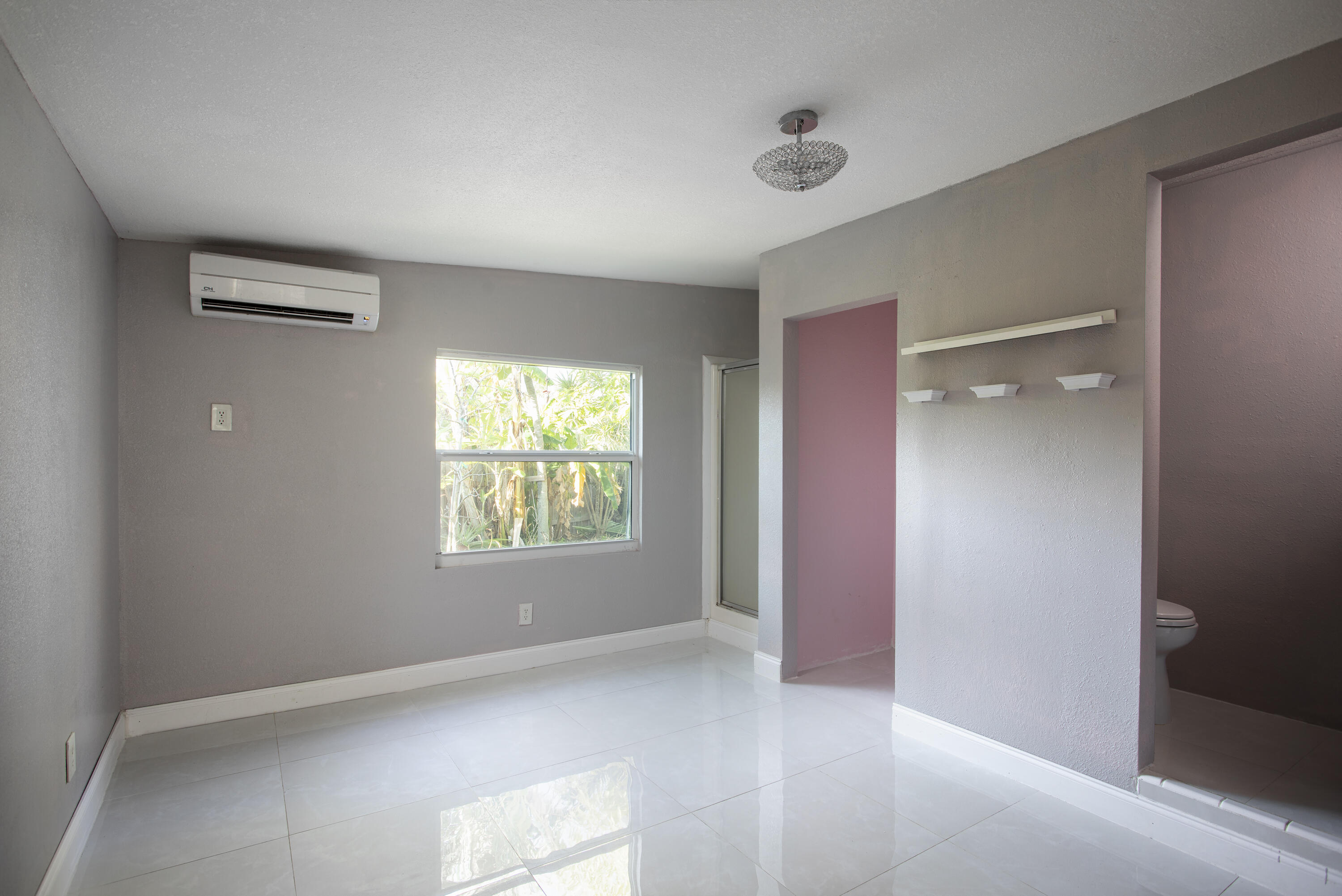 35 Dondi Road Key West, FL 33040 - Photo 8 of 15 a view of an empty room with a window