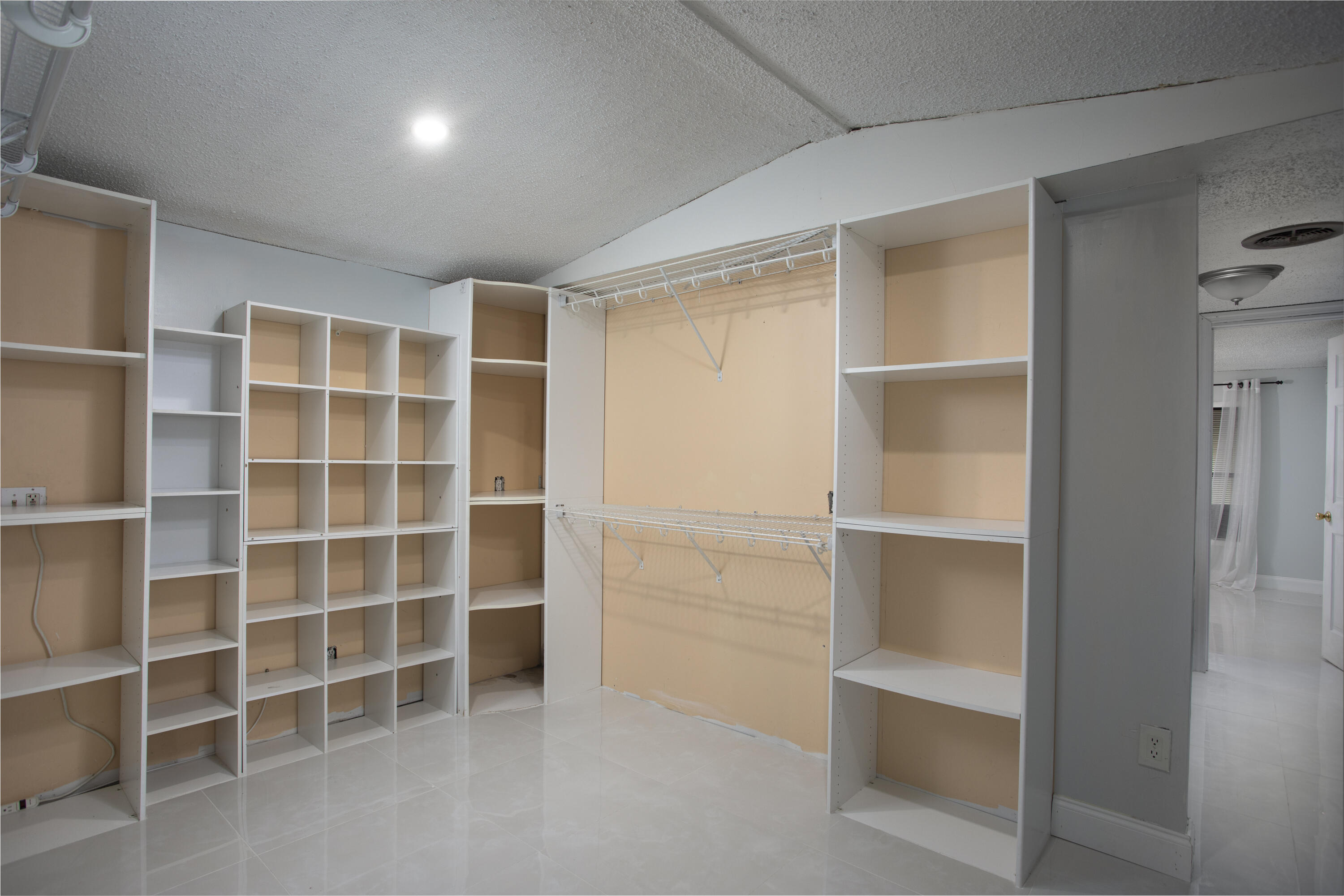 35 Dondi Road Key West, FL 33040 - Photo 9 of 15 a view of an empty room with empty shelves