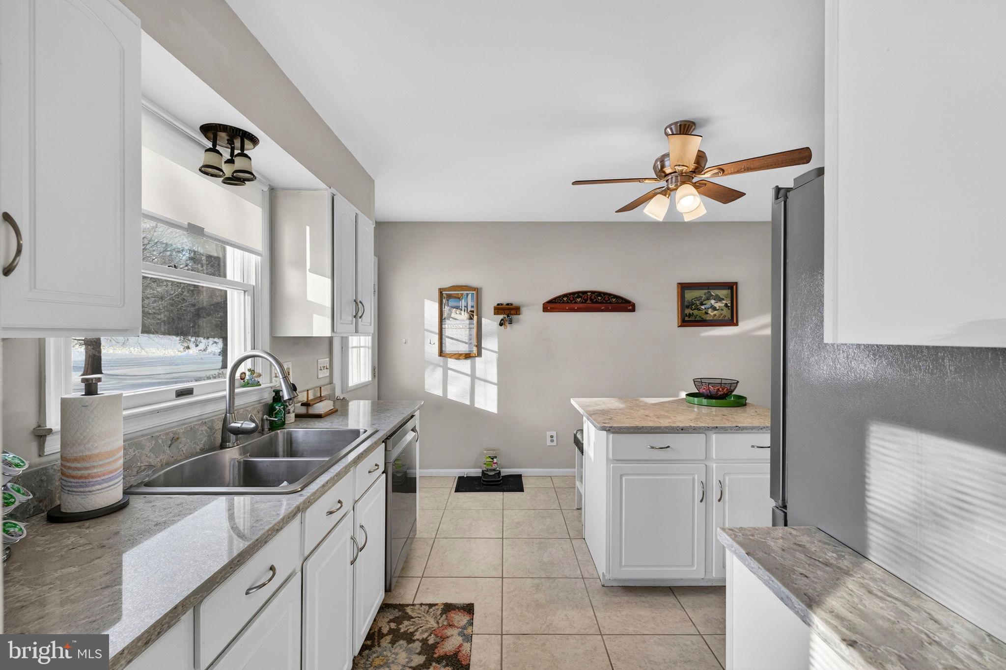3460 Indian Run Road Amissville, VA 20106 - Photo 14 of 57 Bright and inviting kitchen with modern charm.