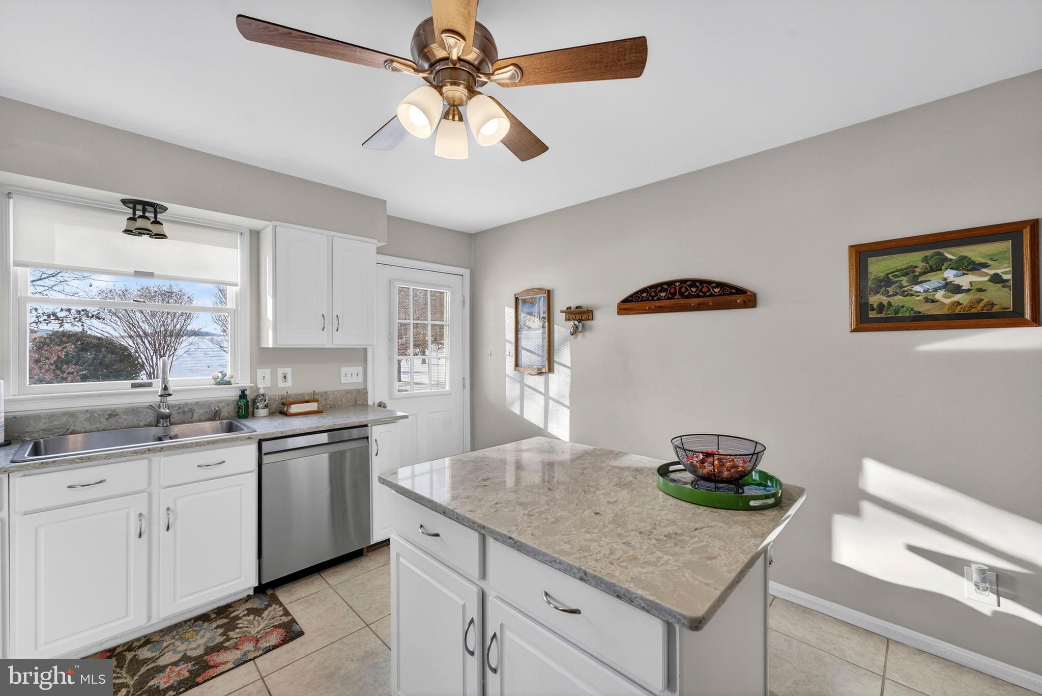 3460 Indian Run Road Amissville, VA 20106 - Photo 17 of 57 Bright and airy kitchen with modern charm.