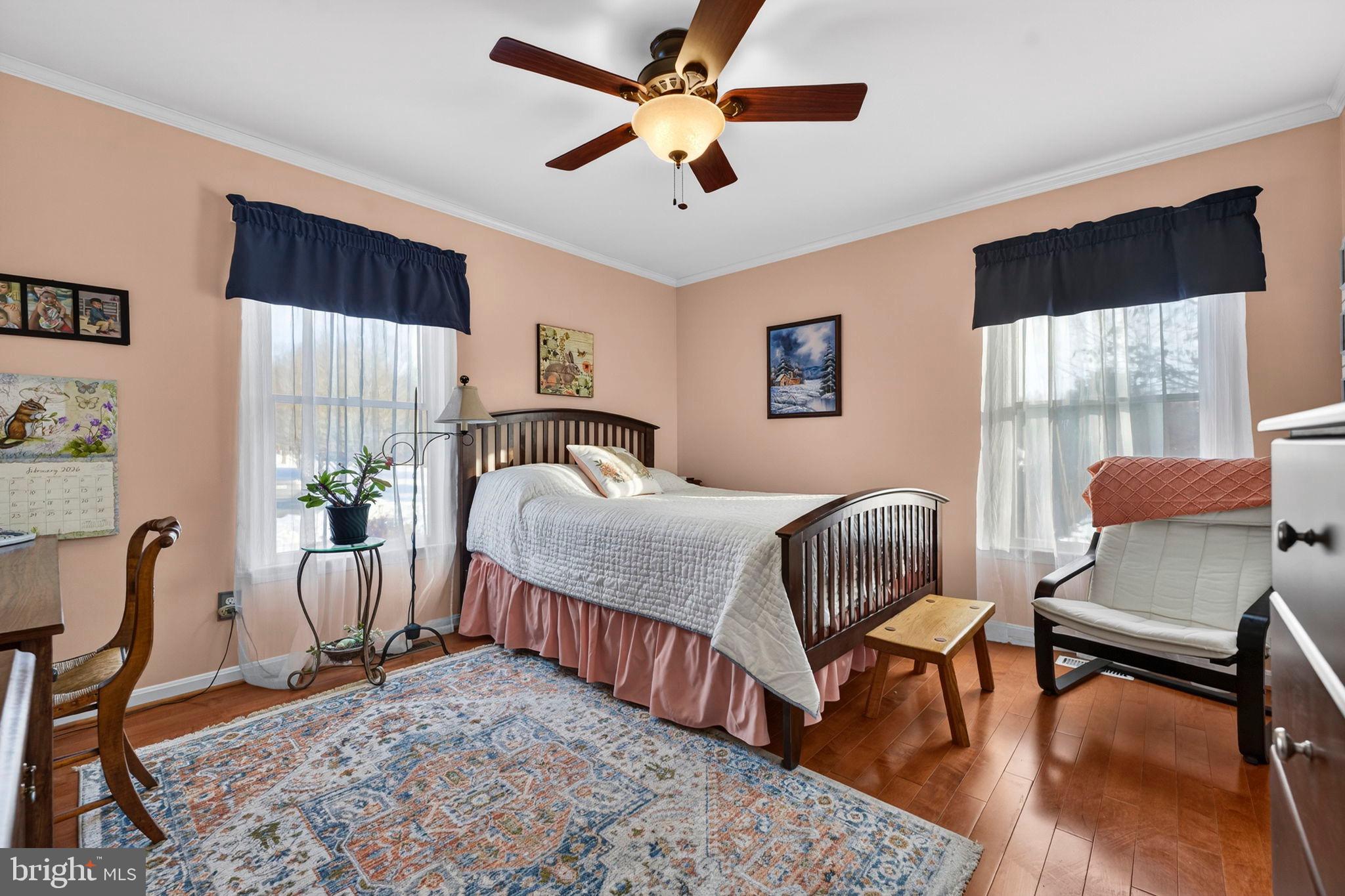 3460 Indian Run Road Amissville, VA 20106 - Photo 28 of 57 Charming bedroom with warm, inviting hues.