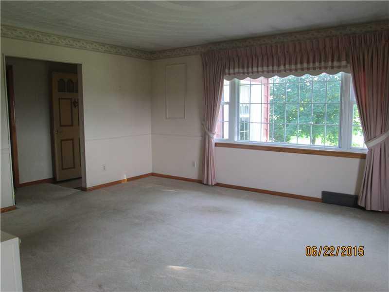 1162 Claypike Road Mount Pleasant, PA 15666 - Photo 5 of 25 Living Room. Hardwood underneath carpet.