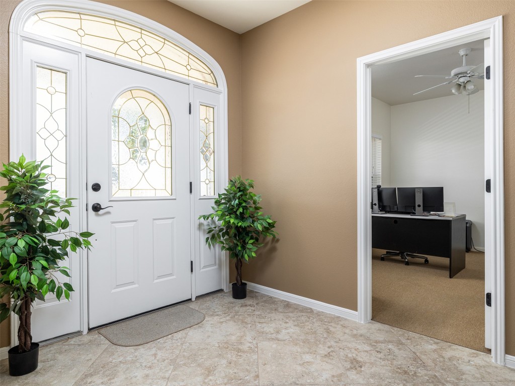 651 County Road 497 Taylor, TX 76574 - Photo 39 of 40 a view of entryway with a potted plant