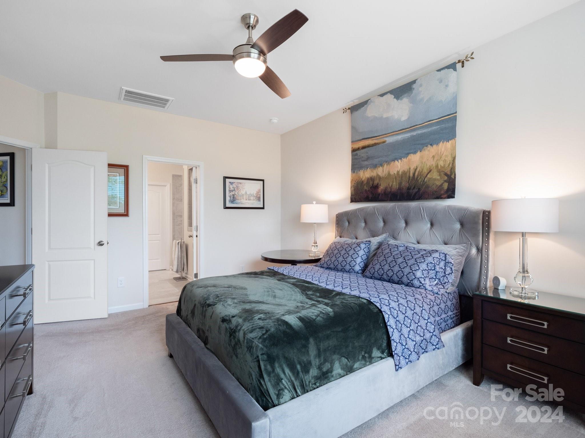 4239 Merrivale Drive Lancaster, SC 29720 - Photo 15 of 33 a bedroom with a bed and a night stand