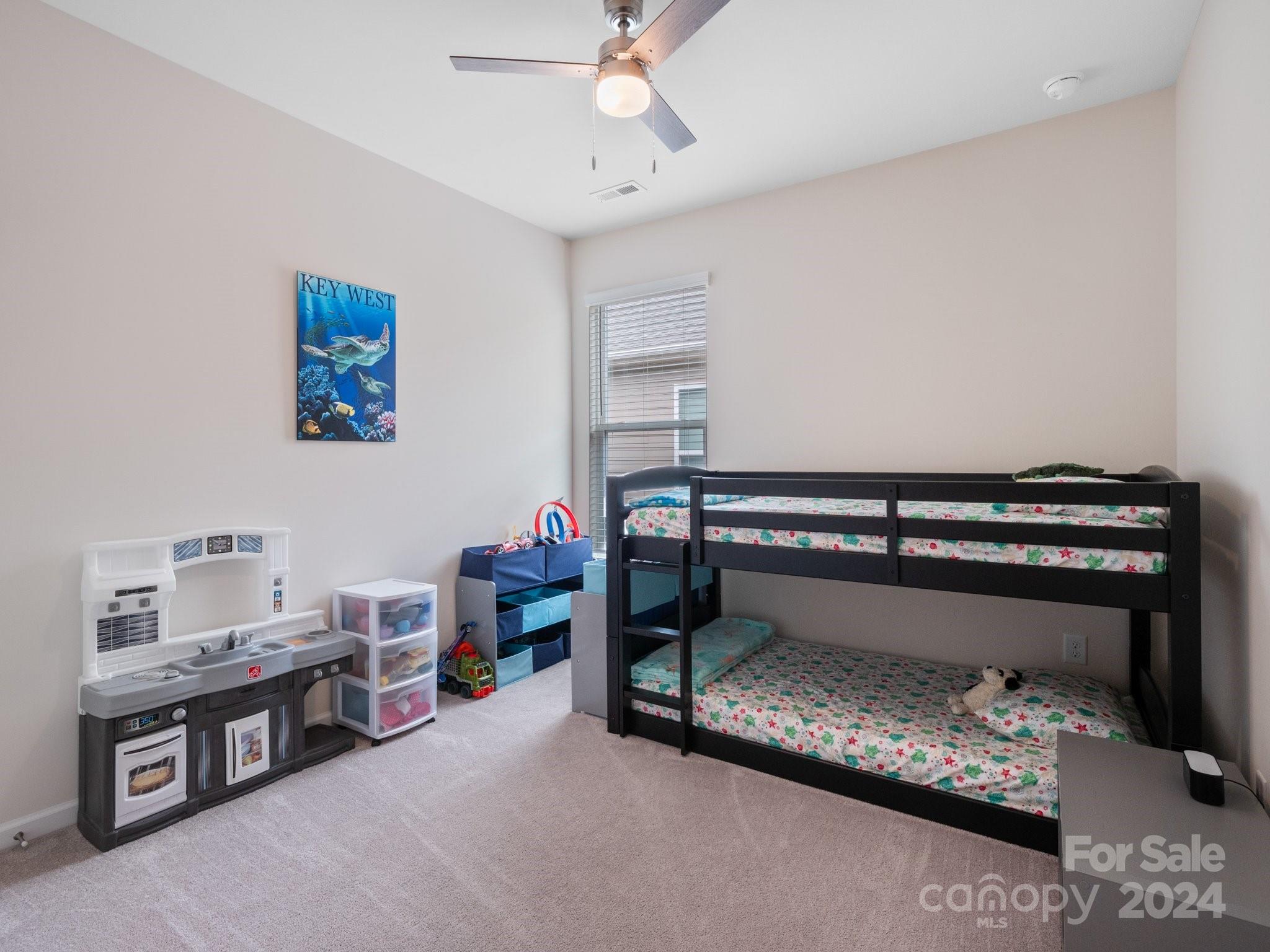 4239 Merrivale Drive Lancaster, SC 29720 - Photo 21 of 33 a bedroom with furniture and a lamp