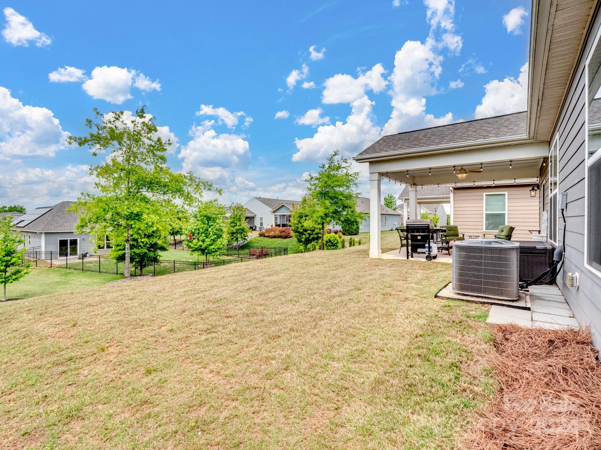 4239 Merrivale Drive Lancaster, SC 29720 - Photo 25 of 33 a view of an chairs and tables in the patio