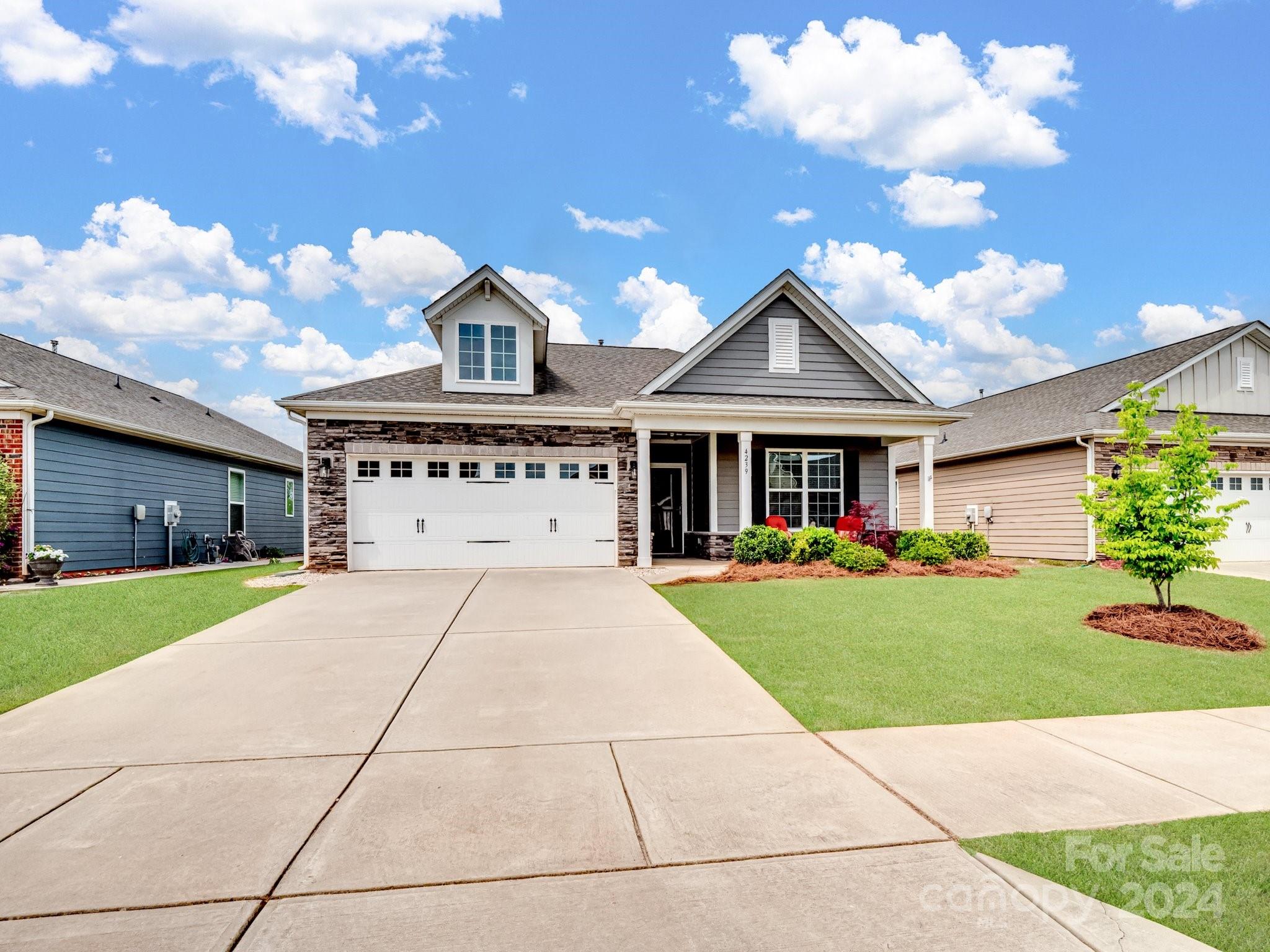 4239 Merrivale Drive Lancaster, SC 29720 - Photo 32 of 33 a front view of a house with garden