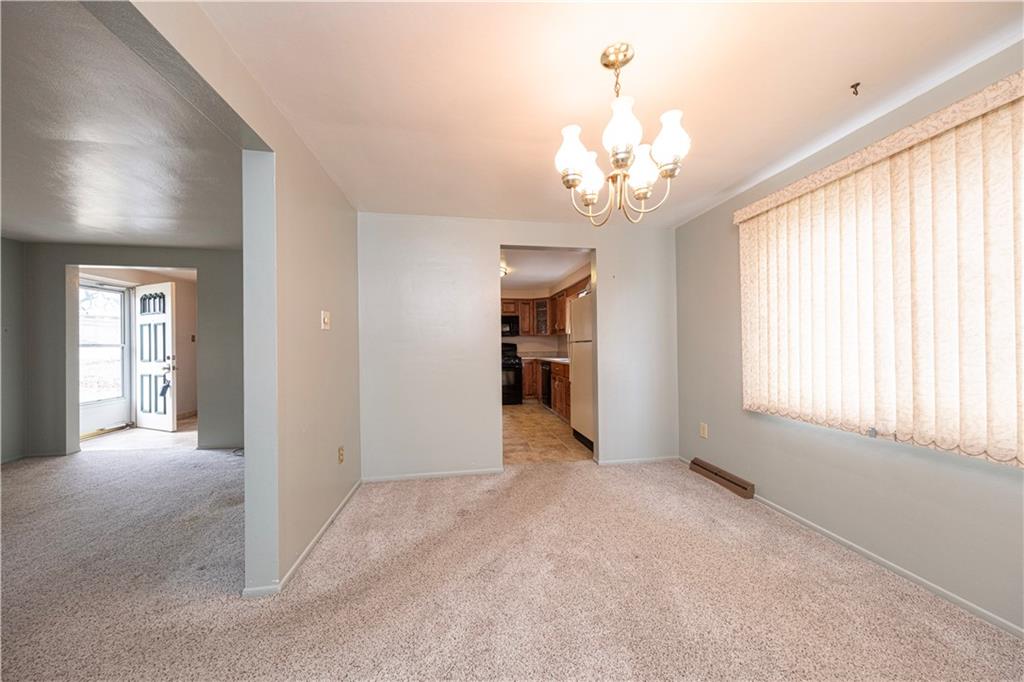 209 Video Drive Homestead, PA 15120 - Photo 12 of 33 a view of an empty room with a window