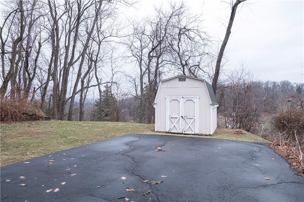 209 Video Drive Homestead, PA 15120 - Photo 24 of 33 a view of big yard with large trees