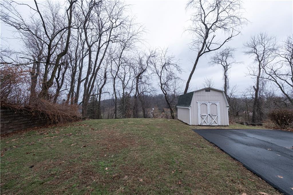 209 Video Drive Homestead, PA 15120 - Photo 26 of 33 a view of large trees with a yard