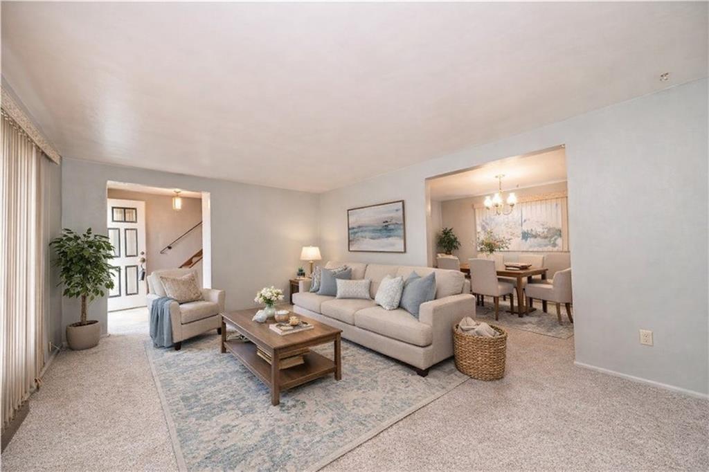 209 Video Drive Homestead, PA 15120 - Photo 3 of 33 a living room with furniture and a large window