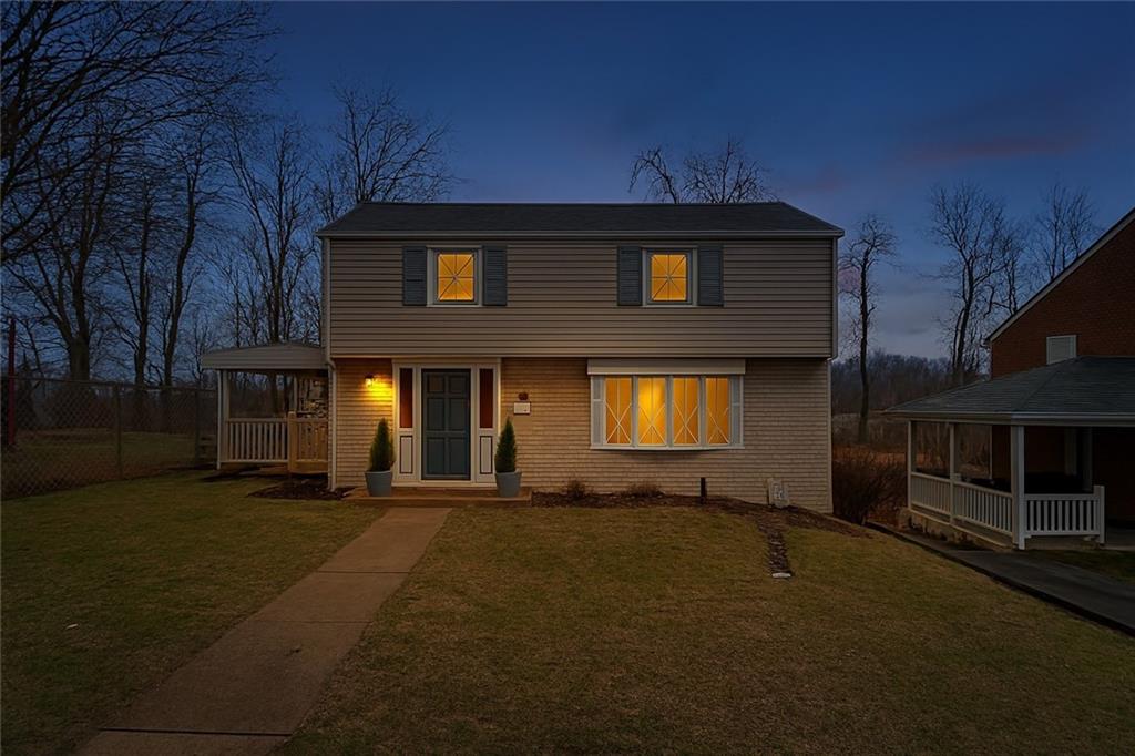 209 Video Drive Homestead, PA 15120 - Photo 32 of 33 a front view of a house with a yard