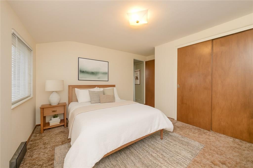 209 Video Drive Homestead, PA 15120 - Photo 8 of 33 a bedroom with a bed and a painting