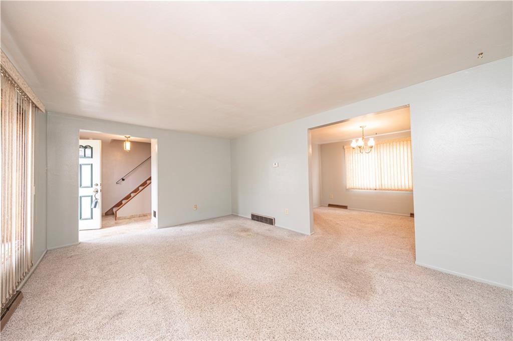 209 Video Drive Homestead, PA 15120 - Photo 10 of 33 a view of an empty room with a window