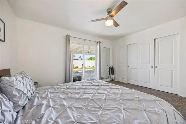 a room with a bed and a window