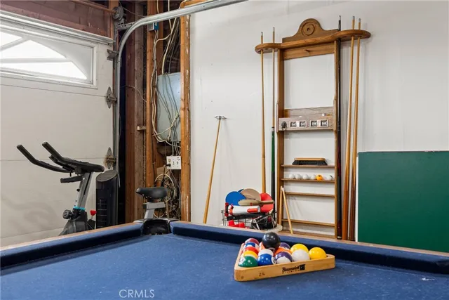 a view of a swimming pool with an outdoor seating
