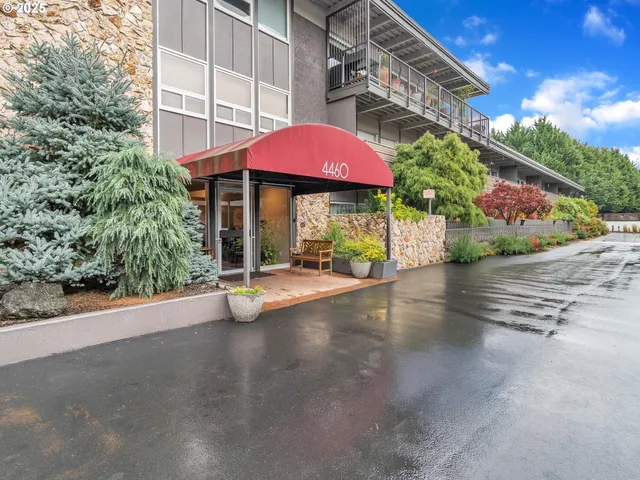 a view of a street with sitting area
