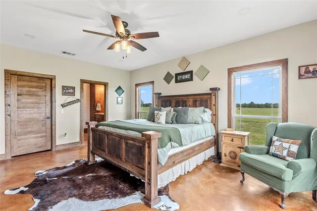 a bed room with a bed and a couch