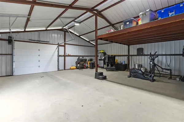 a view of a garage with storage