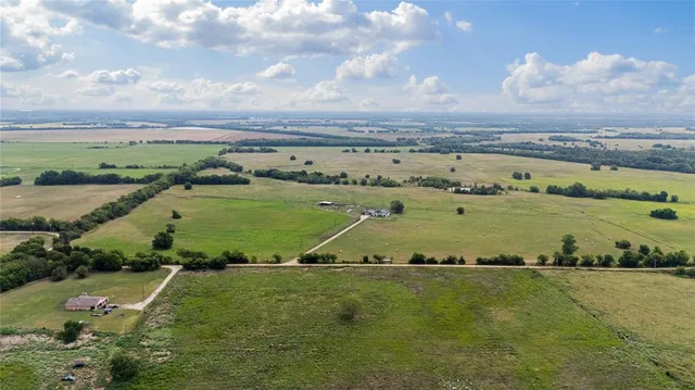 an aerial view of a city with lots of residential buildings