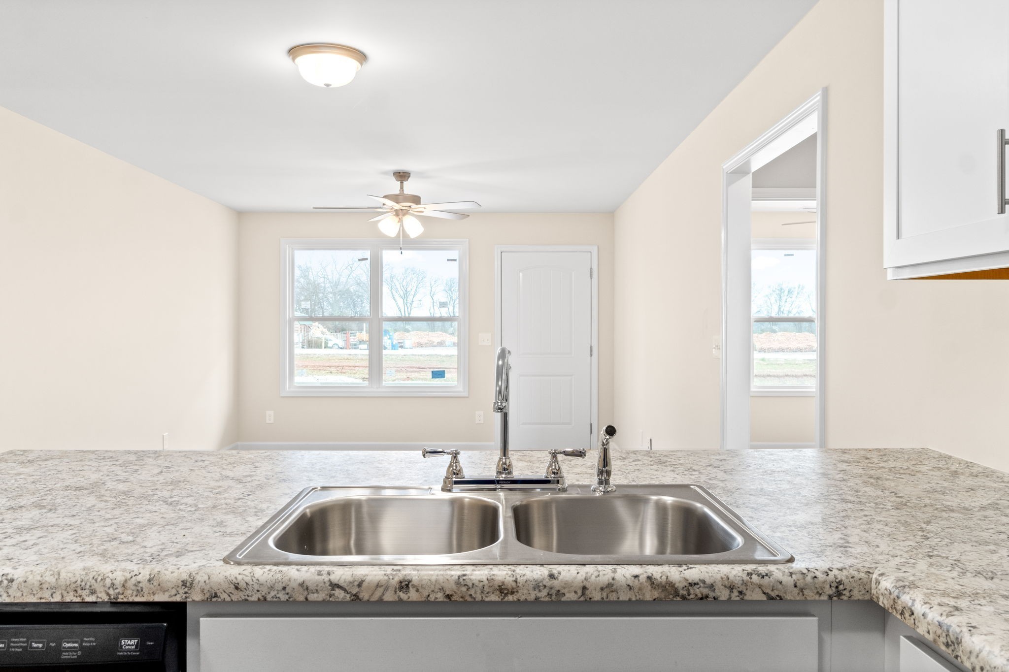 9550 Russellville Road, Unit C Guthrie, KY 42234 - Photo 8 of 23 a kitchen with granite countertop a sink and a window