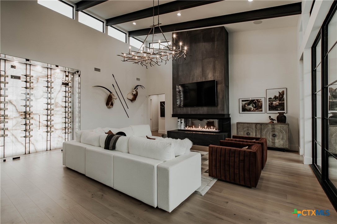 3466 Levi Sloan Road Victoria, TX 77904 - Photo 11 of 48 a living room with furniture and a flat screen tv