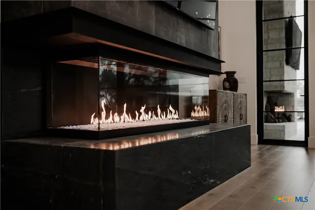 a front view of a house with a street