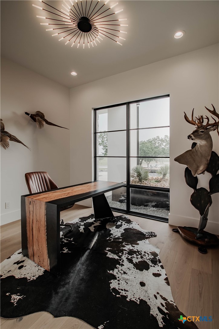 3466 Levi Sloan Road Victoria, TX 77904 - Photo 21 of 48 a very nice looking living room with a large window and a rug