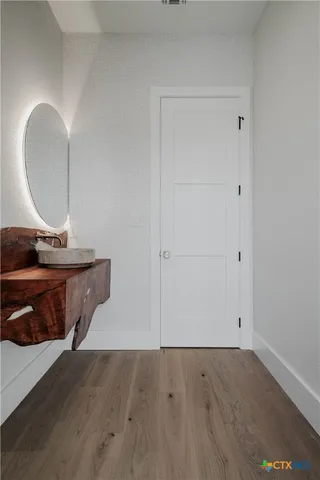 a kitchen with sink and window