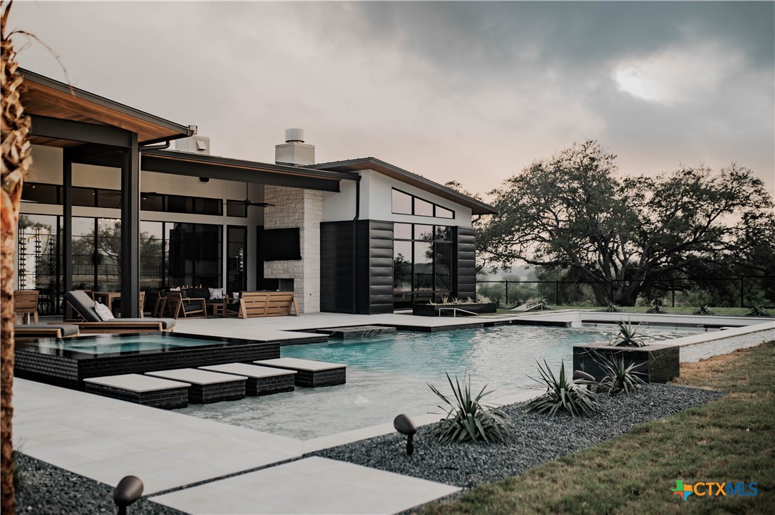 3466 Levi Sloan Road Victoria, TX 77904 - Photo 34 of 48 a view of a house with pool and sitting area