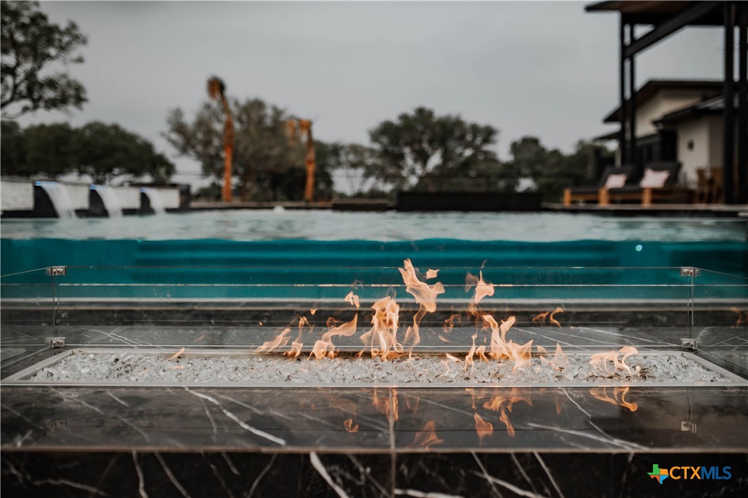 3466 Levi Sloan Road Victoria, TX 77904 - Photo 37 of 48 a view of a yard with a bench