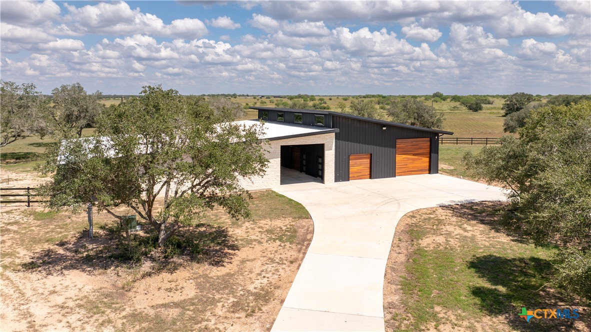 3466 Levi Sloan Road Victoria, TX 77904 - Photo 39 of 48 a view of a house with a yard