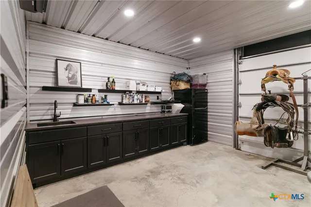 a bathroom with a toilet and a mirror