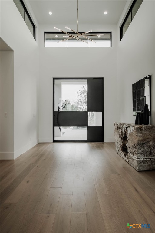 3466 Levi Sloan Road Victoria, TX 77904 - Photo 6 of 48 a view of an empty room with a fireplace and wooden floor