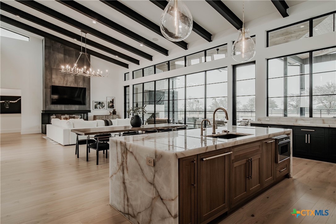 3466 Levi Sloan Road Victoria, TX 77904 - Photo 8 of 48 a kitchen with lots of counter top space and dining table