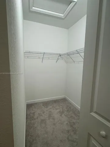 a view of an empty walk in closet