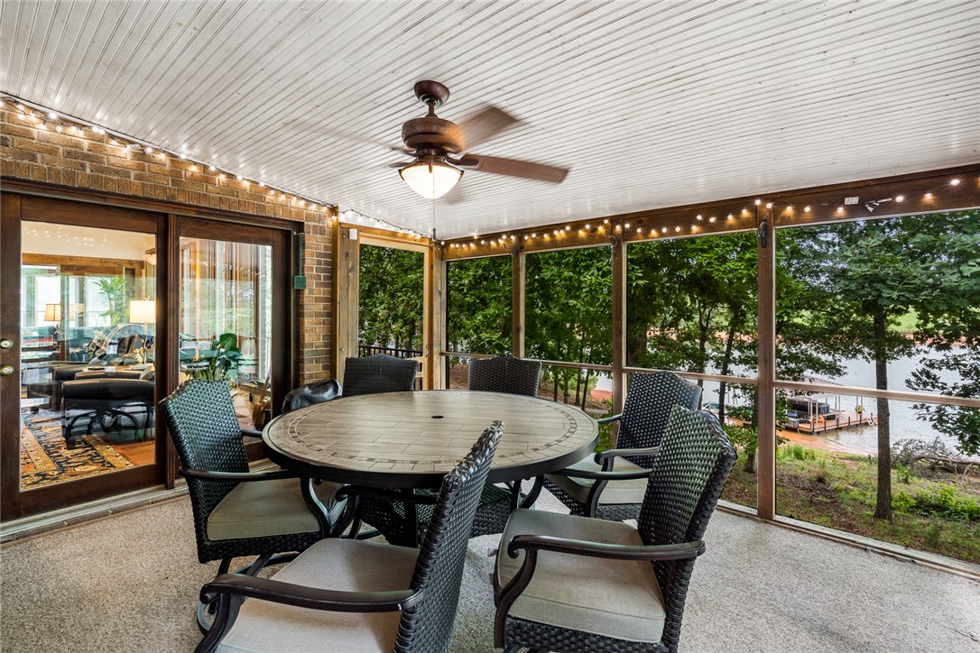2817 Providence Church Road Anderson, SC 29626 - Photo 23 of 35 Enjoy tranquil lake views and gentle breezes from this charming screened porch with ceiling fan.