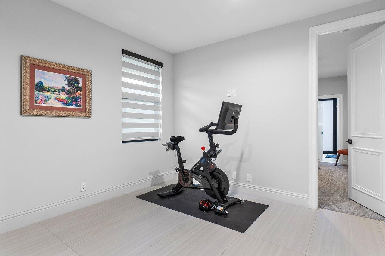 17607 Bocaire Place Boca Raton, FL 33487 - Photo 28 of 62 a view of a room with gym equipment