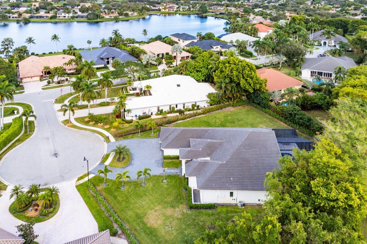 17607 Bocaire Place Boca Raton, FL 33487 - Photo 42 of 62 an aerial view of residential houses with outdoor space and parking