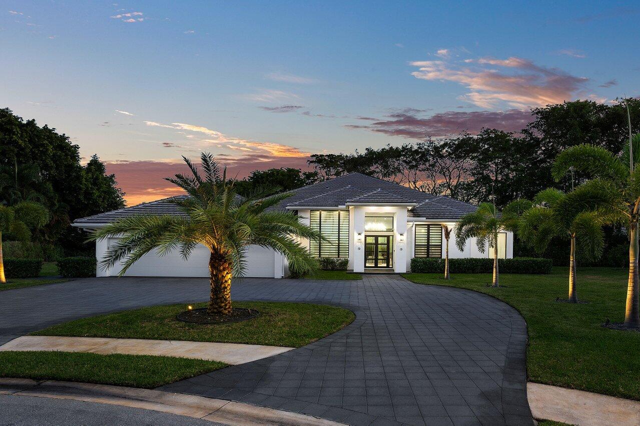 17607 Bocaire Place Boca Raton, FL 33487 - Photo 45 of 62 a front view of house with yard and green space