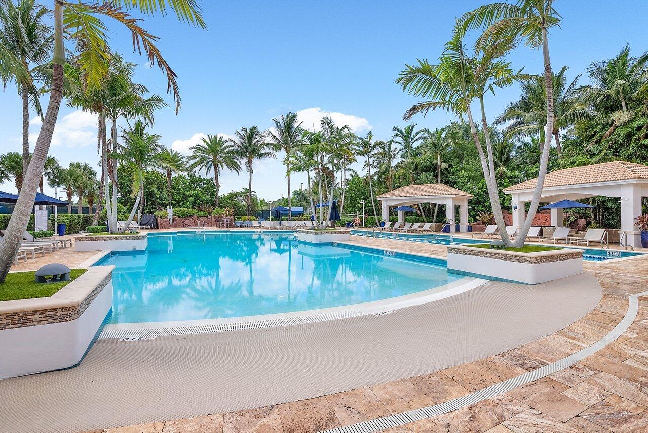 17607 Bocaire Place Boca Raton, FL 33487 - Photo 56 of 62 a view of a swimming pool with a patio