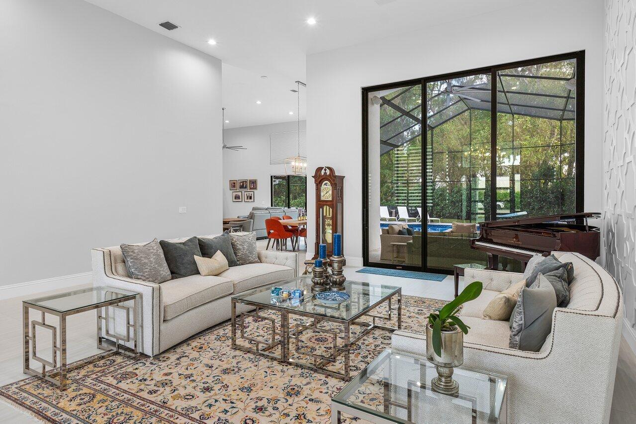 17607 Bocaire Place Boca Raton, FL 33487 - Photo 10 of 62 a living room with furniture and a large window