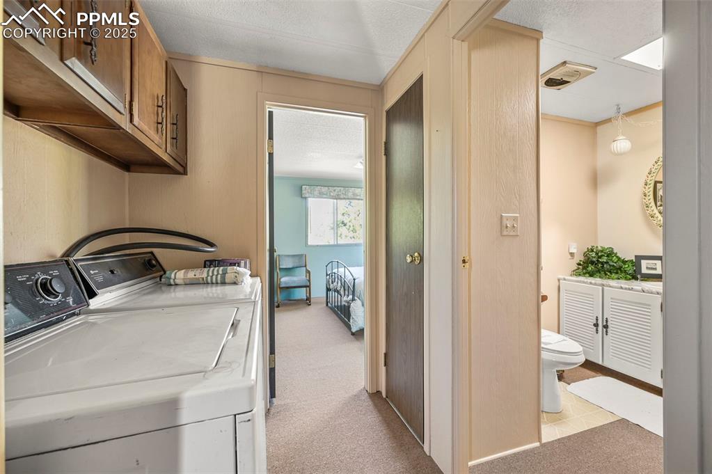 332 Valley Circle Guffey, CO 80820 - Photo 21 of 32 a view of a bathroom with a sink and shower