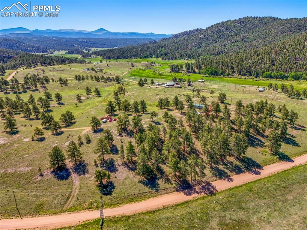 332 Valley Circle Guffey, CO 80820 - Photo 31 of 32 a view of a town with mountains in the background